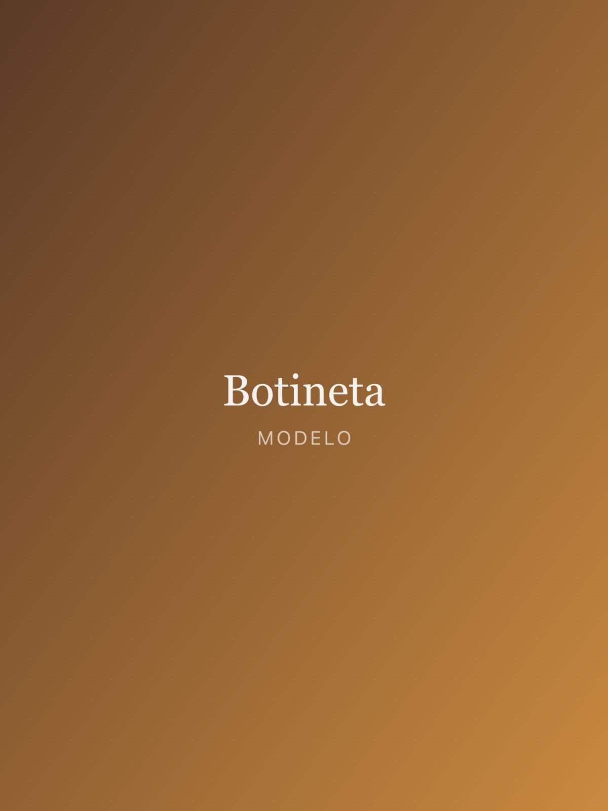 Botineta de dama en gamuza negra, vista de tres cuartos.